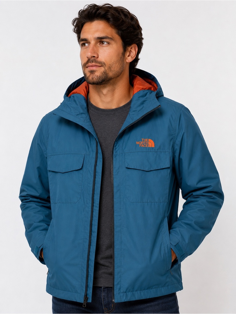 The North Face Orange Jacket with Teal Accents